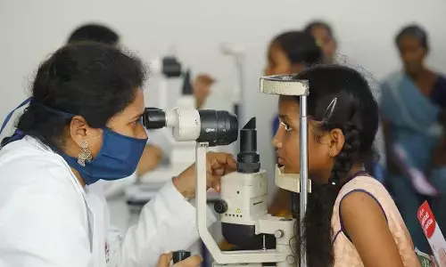 Visitors availing eye camp facility organised by Brandix at Atchutapuram in Anakapalli