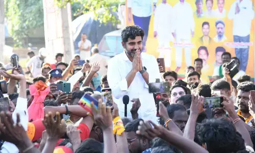 TDP national general secretary Nara Lokesh addressing the villagers at KM Puram in Karvetinagaram mandal in Chittoor district on Sunday