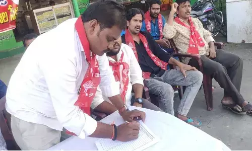 CPI leaders launching a signature campaign against the governments decision on the Bhadrachalam panchayat issue on Sunday