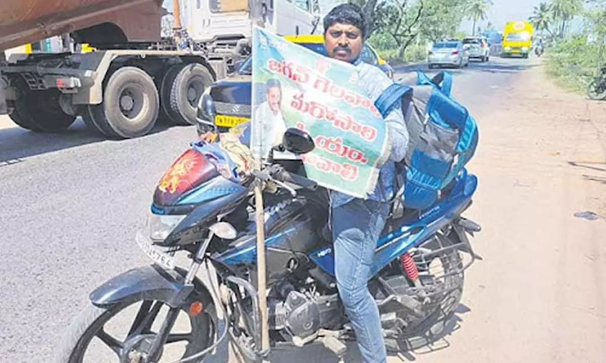 Young man starts bike yatra from Hyderabad to Vizianagaram wishing YS Jagan to become CM again