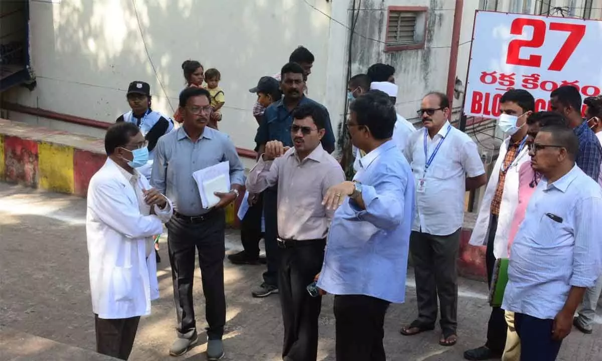 District collector A Mallikarjuna instructing KGH officials in Visakhapatnam on Monday
