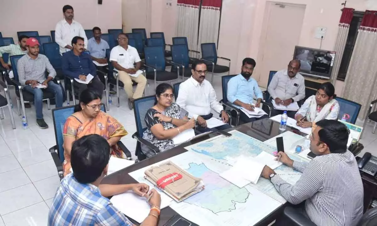 District Collector Chakradhar Babu interacting with officials at his camp office in Nellore on Monday