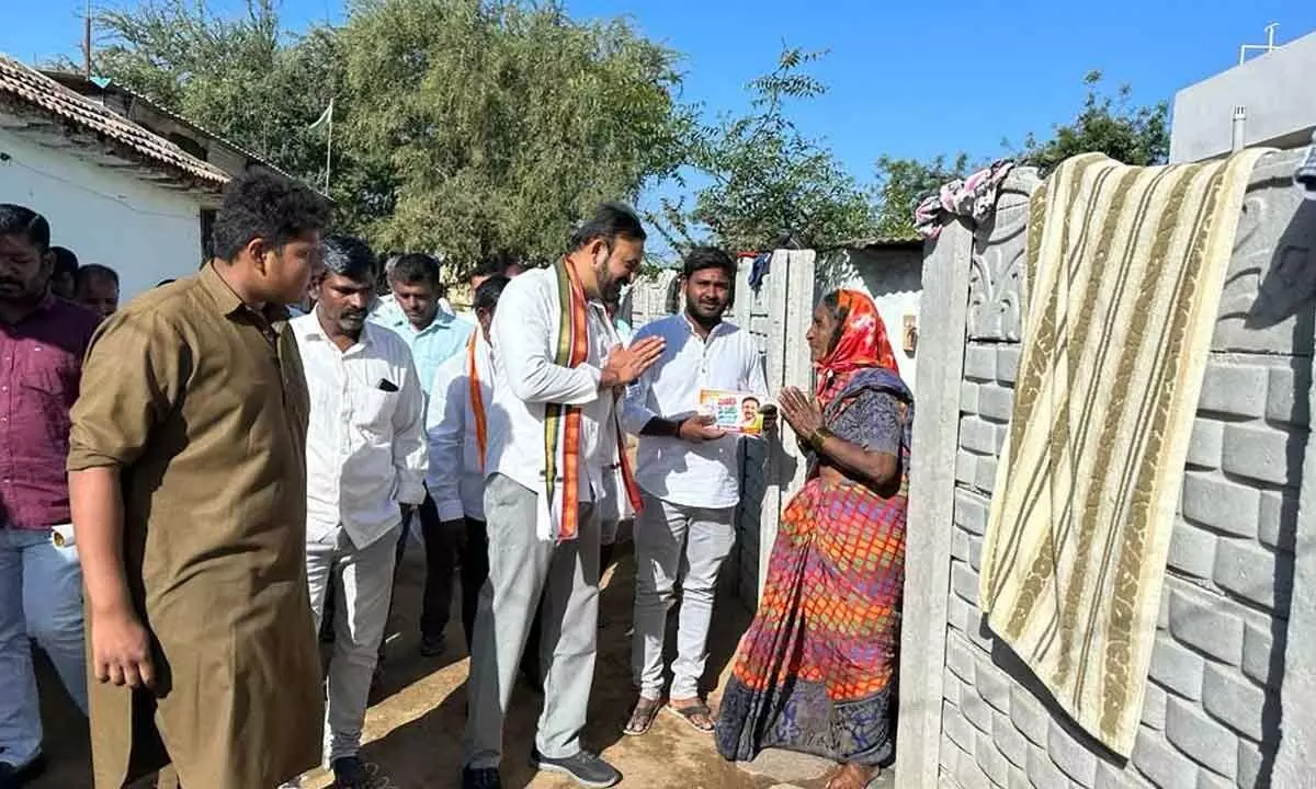 TPCC vice-president Madanmohan interacting with a resident in Yellareddy Constituency as part of Gadapa Gadapaku Congress programme on Tuesday