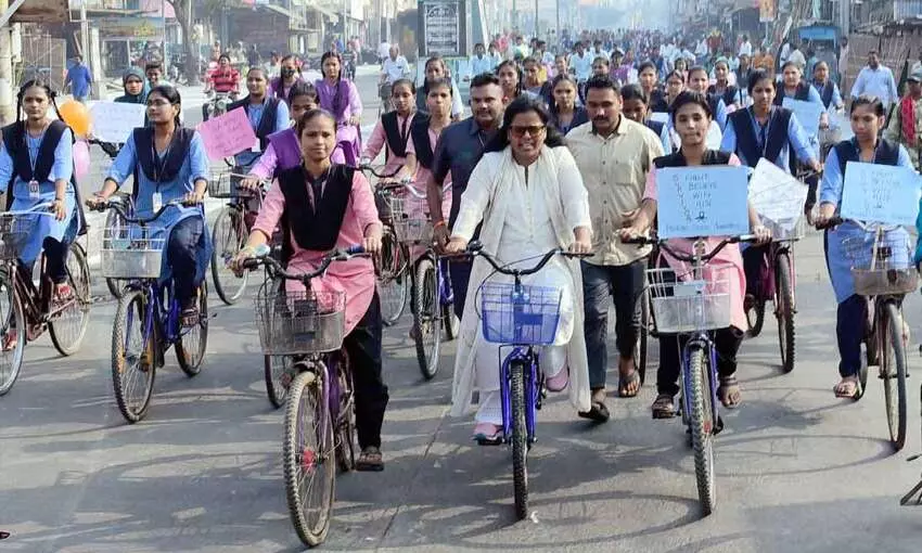 Bapatla District Collector Vijaya Krishnan leading a cycle rally in Chirala on Tuesday