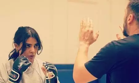 Samantha is preparing for an action sequence