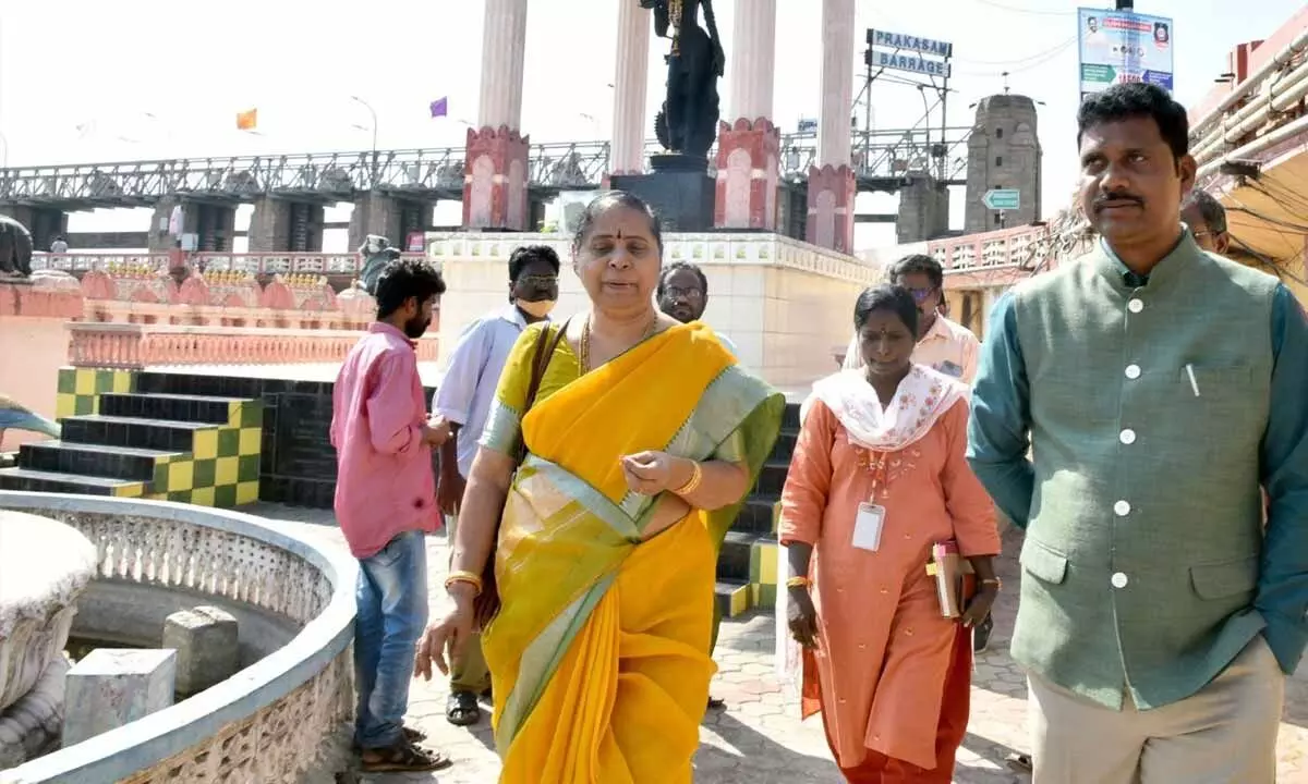 NTR district Collector S Dilli Rao and Durga Temple EO D Bramaramba at Krishnaveni statue in Vijayawada on Wednesday