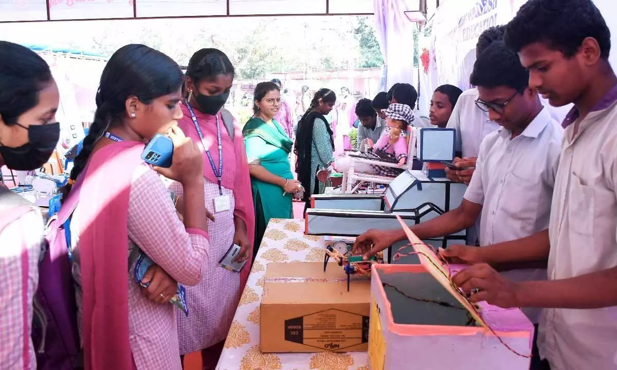 Students exhibiting their devices at a stall at the Book Festival at Polytechnic grounds in Vijayawada on Wednesday