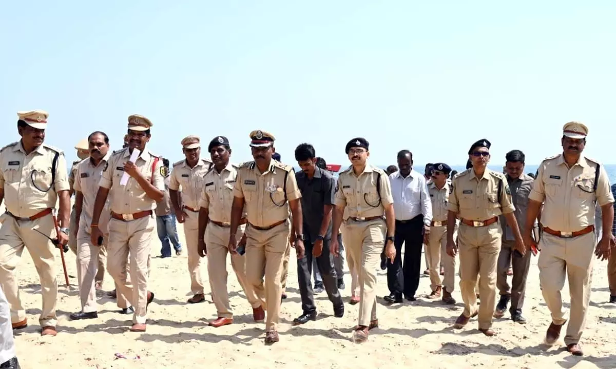A posse of police examining the security arrangements at RK Beach in Visakhapatnam
