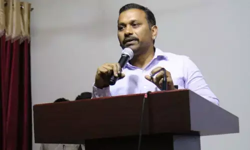 Deputy Commissioner of Income Tax  P Prem Kumar speaking at the valedictory programme of national conference at Andhra Loyola College in Vijayawada on Wednesday