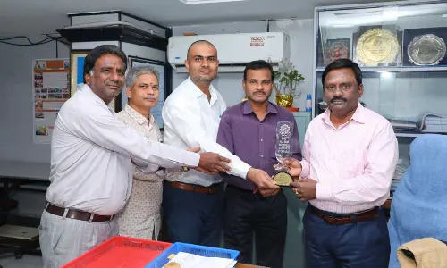 SCCL GM  M Suresh receiving second prize in Hyderabad on Wednesday.
