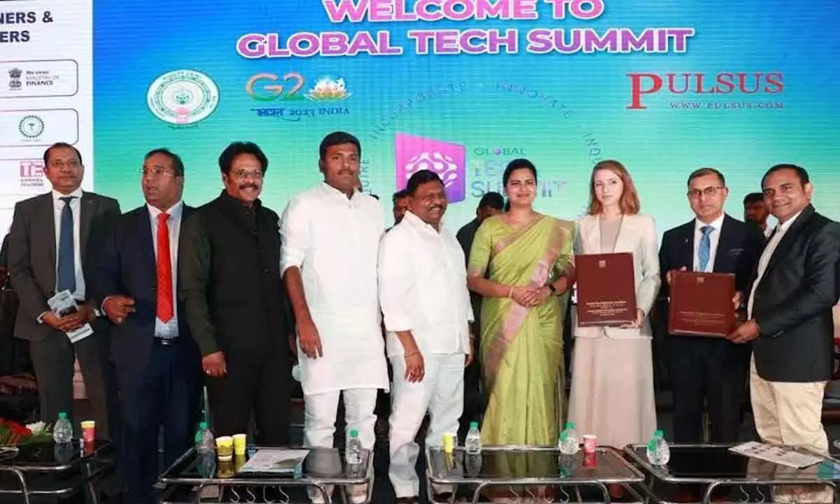 MoU documents being exchanged in the presence of ministers, MP and other dignitaries at the Global Tech Summit in Visakhapatnam on Thursday