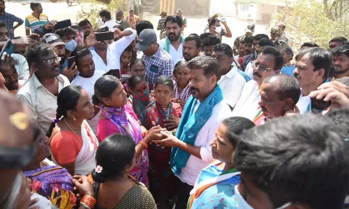 TPCC president A Revanth Reddy speaking to women at Wardhannapet as part of Hath Se Hath Jodo Yatra on Thursday