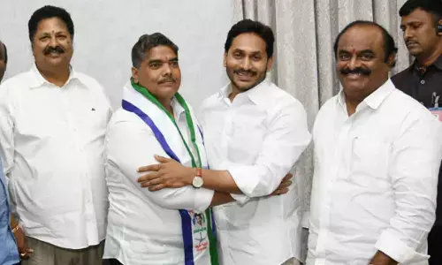 Former TDP MLA Jayamangala Venkata Ramana joining YSRCP in the presence of party chief and Chief Minister Y S Jagan Mohan Reddy at CM camp office in Tadepalli on Thursday.  Civil supplies minister K Venkata Nageswara Rao and Kaikaluru MLA Dulam Nageswara Rao are also seen.