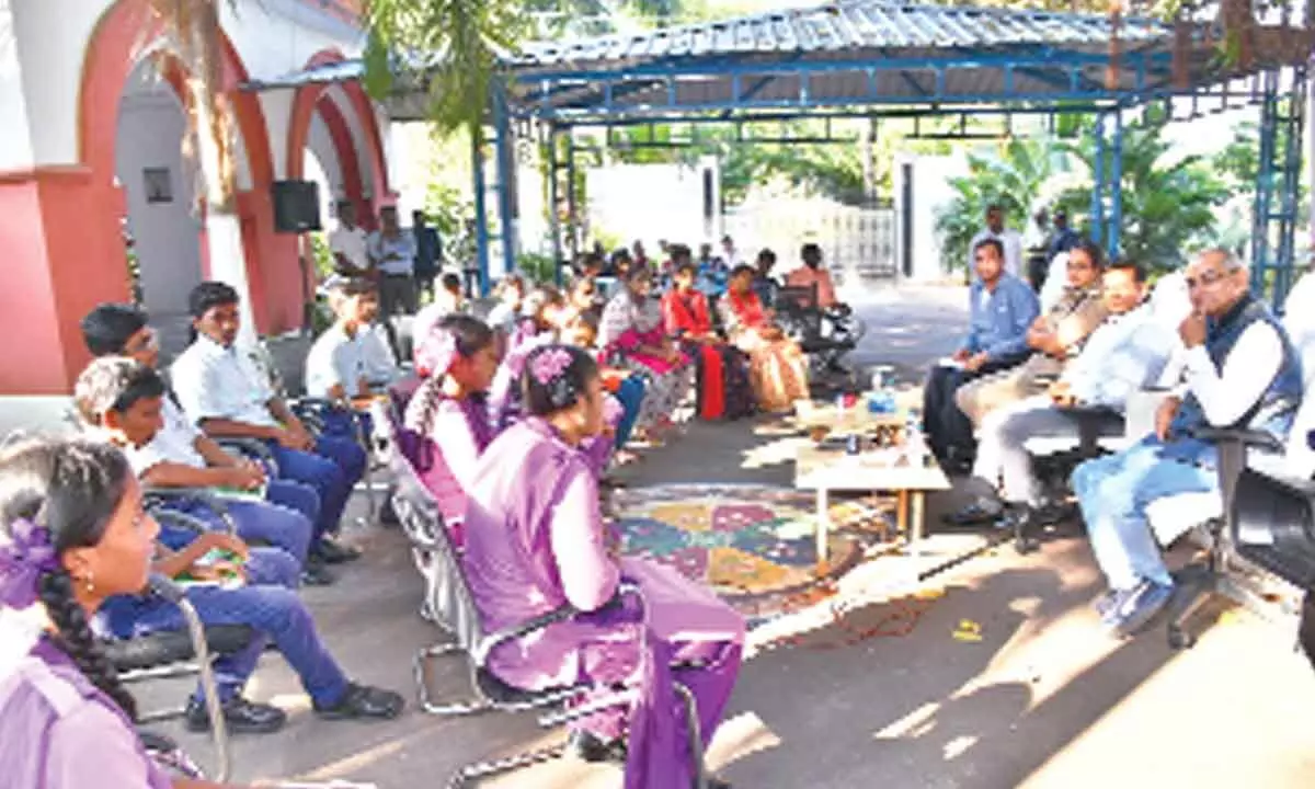 The Central government expert committee members RD Talukdar and Sita Ram Meena, along with Collector AS Dinesh Kumar and SP Malika Garg, interacting with students at ‘Coffee with Collector’ programme in Ongole on Friday