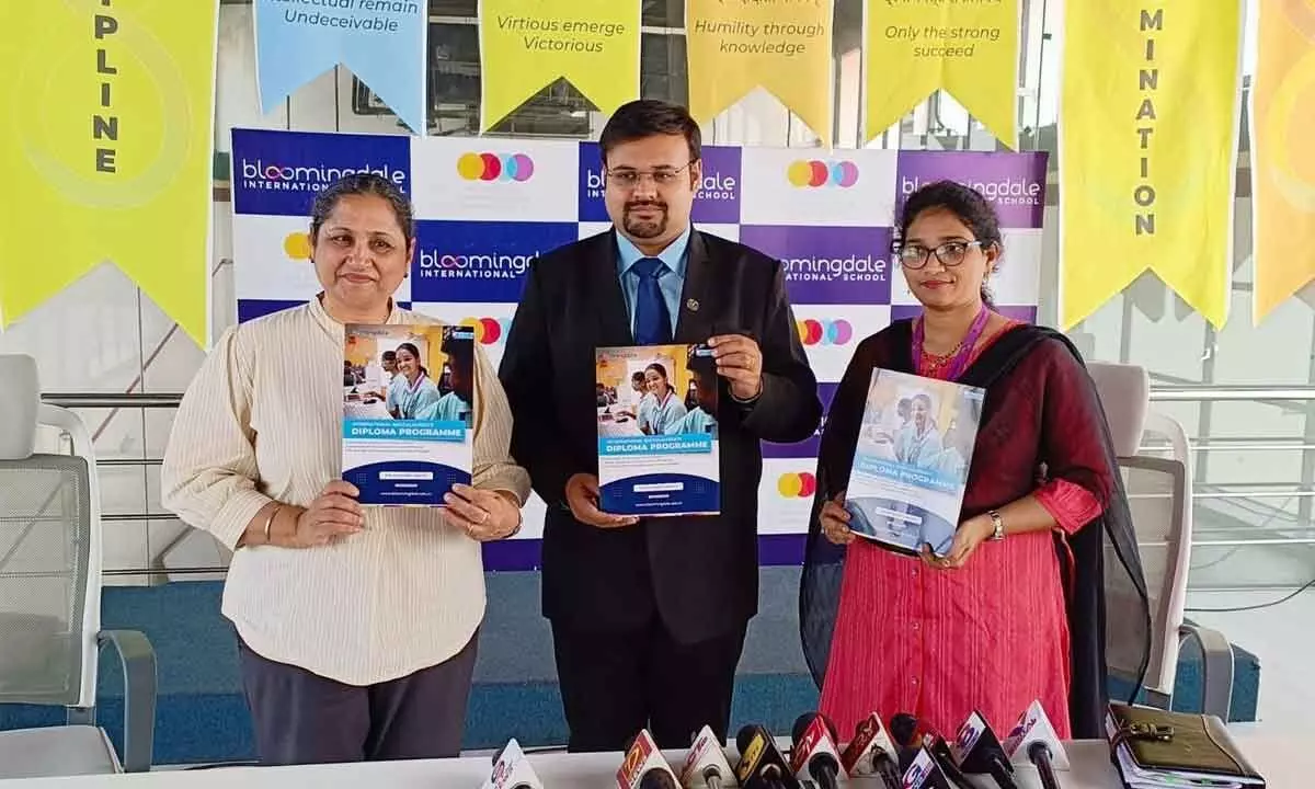 Bloomingdale School Principal Harsimaran Kaur Kapany unveiling diploma programme booklet at the school in Vijayawada on Friday