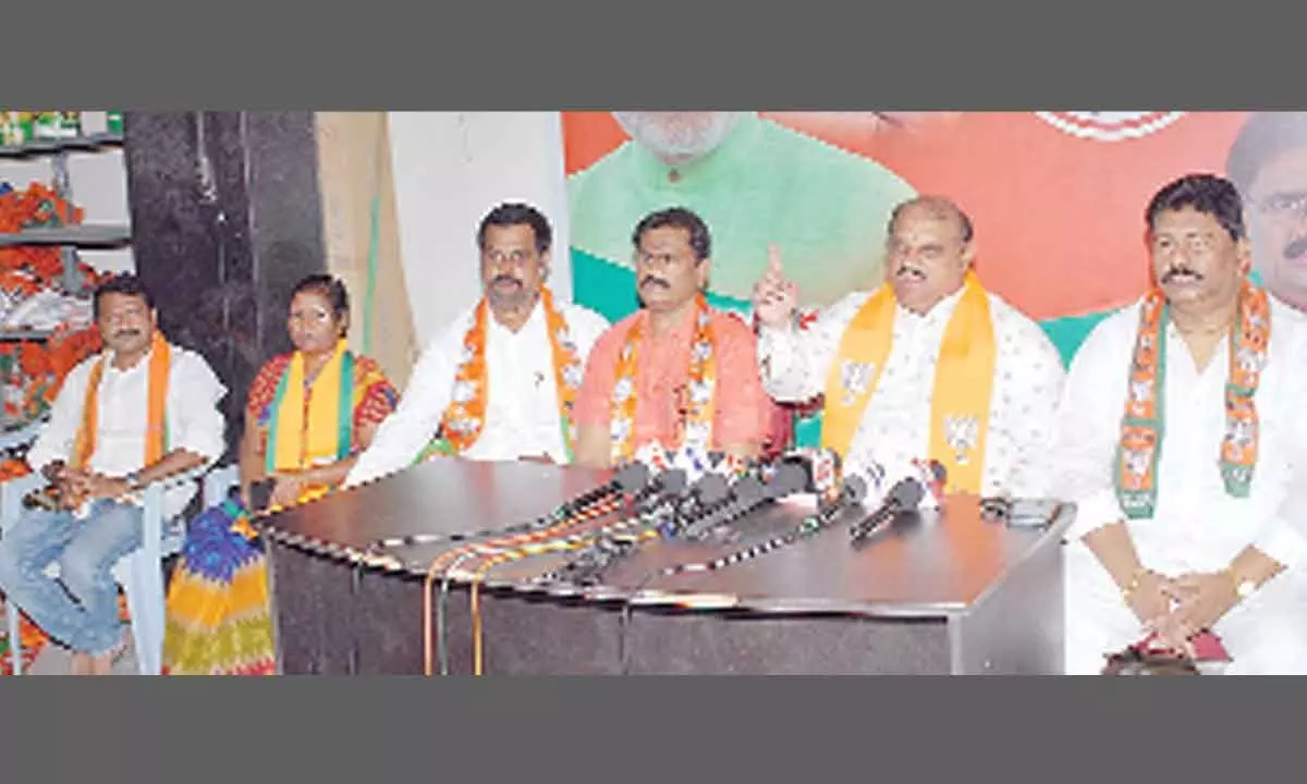 BJP AP general secretary V Suryanarayana Raju, Prakaam district leaders speaking in a press meet in Ongole on Friday