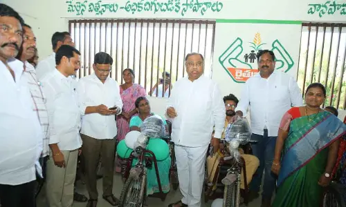 MLA Kandala Upender Reddy distributing tri-cycles in Kusumanchi to mark CM KCR’s birthday celebrations on Friday.