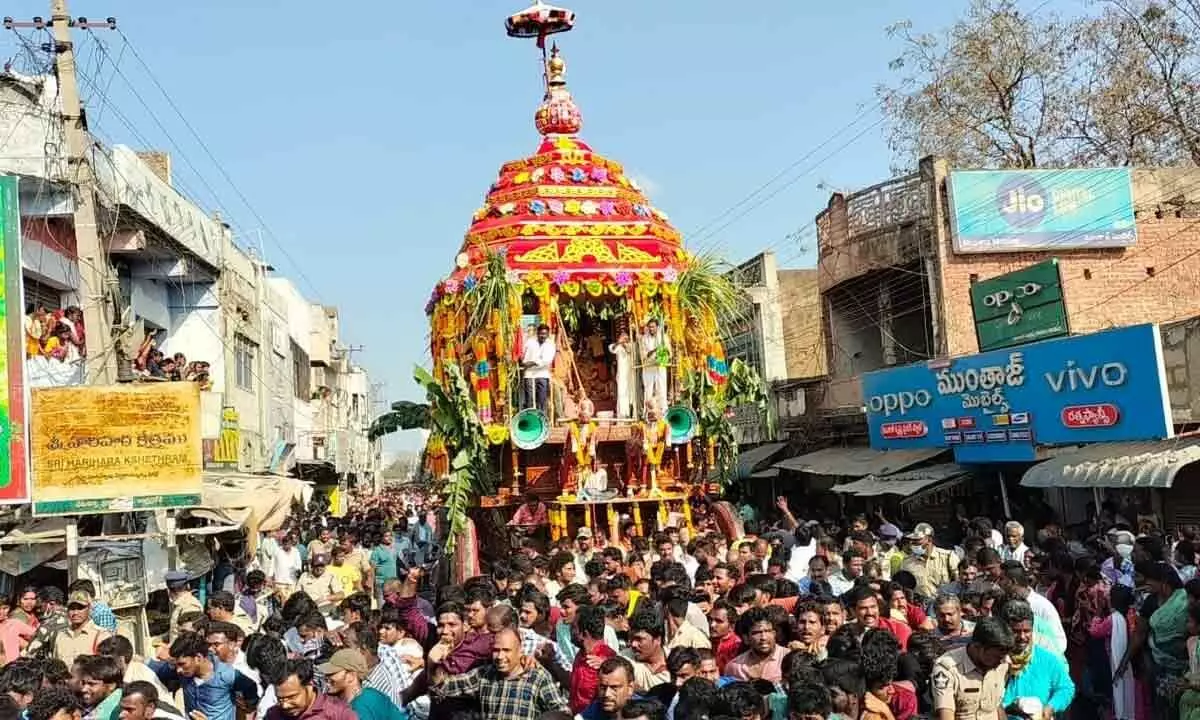 Devotees participating in Rathostsavam in Podili on Sunday
