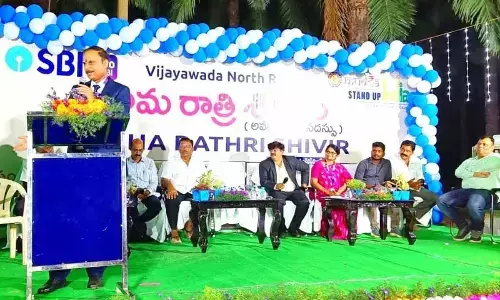 SBI Amaravati Circle CGM Naveen Chandra Jha addressing a programme at Pedapativarigudem on Sunday
