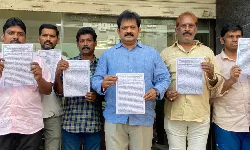 Rayalaseema Steering Committee member P Naveen Kumar Reddy and others releasing poster on ‘Chalo Adoni’ Maha Padayatra at a programme, in Tirupati on Sunday