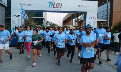 Hyderabad: Wellness, inclusive camaraderie and residential area striking of one body against another pick out centre large platform on which people are seen by an audience at JP Morgan Run