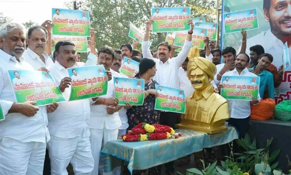 Ministers and former ministers along with the MLAs perform Palabhishekam to the statue of Dr Y S Rajasekhar Reddy at the police control room in Vijayawada on Tuesday