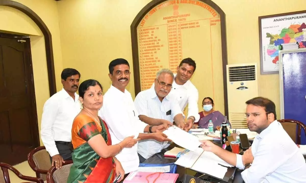 Graduates Kadapa-Anantapur-Kurnool constituency PDF MLC candidate Pthula Nagaraju (middle) submitting nomination to in-charge Collector and Electoral Officer Kethan Garg in Anantapur