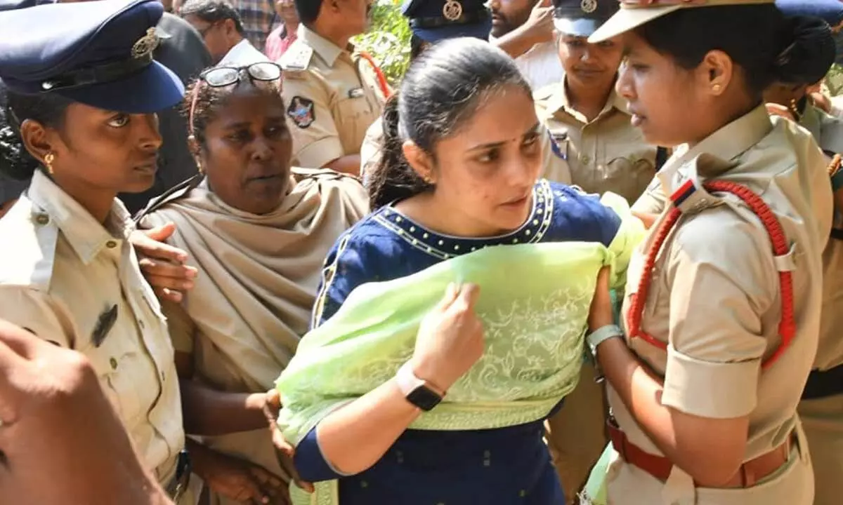 Police preventing Chandana, TDP leader Kommareddy Pattabhiram’s wife, from going to Gannavaram at her house in Vijayawada  on Tuesday  Photo: Ch Venkata Mastan