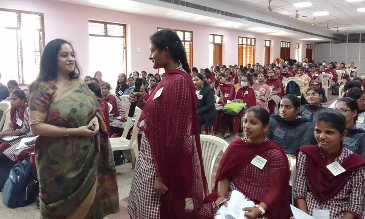 Psychologist Dr Jaya Mohan interacting with a student at a workshop at Maris Stella College in Vijayawada  on Tuesday