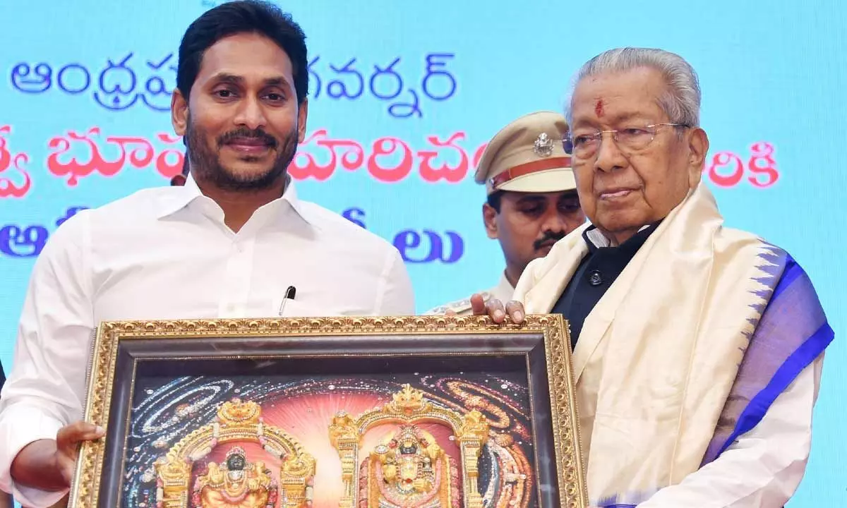 Chief Minister YS Jagan Mohan Reddy felicitating outgoing Governor Biswabhushan Harichandan at the farewell meeting in Vijayawada on Tuesday