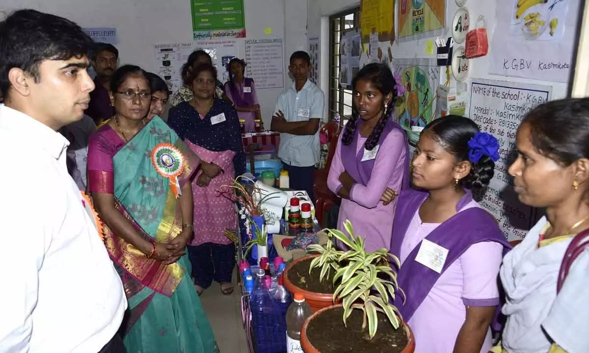 District Collector Ravi Subhash Pattanshetti interacting with the students at the science fair in Anakapalli district on Wednesday