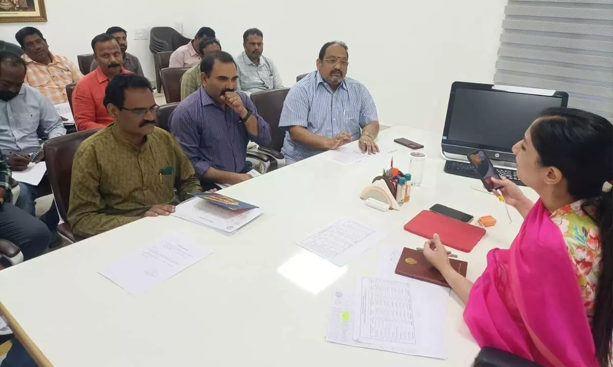 Municipal Commissioner Anupama Anjali holding a review with revenue officials to speed up tax collection in Tirupati on Wednesday