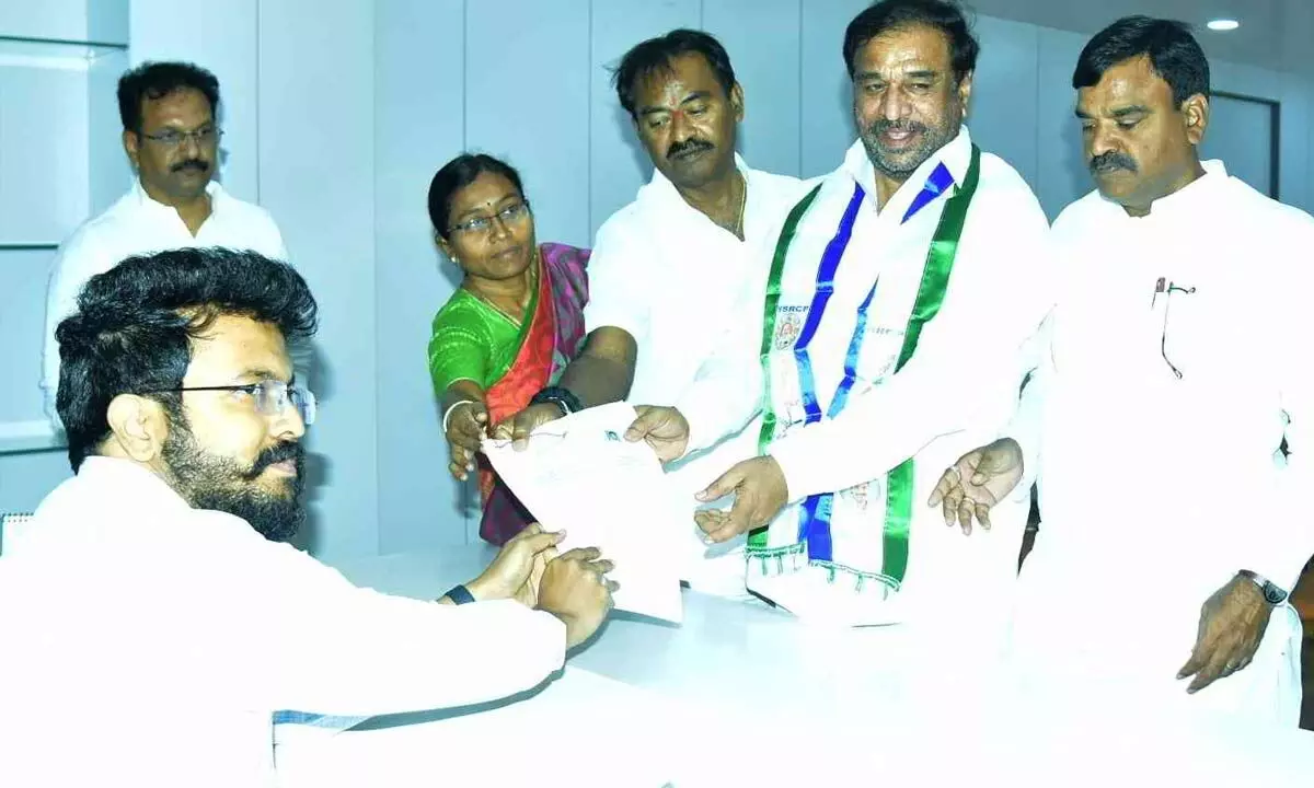 Former Jammalama dugu MLA Ponnapureddy Rama Subba Reddy filing nomination papers as MLC candidate for local bodies election on behalf of YSR Congress party in Kadapa on Wednesday. 