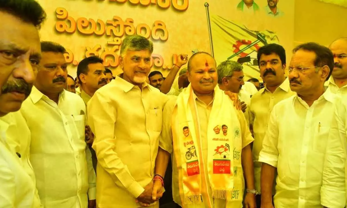 TDP national president N Chandrababu Naidu welcoming former minister Kanna Lakshminarayana into the TDP at the party state office in Mangalagiri on Thursday