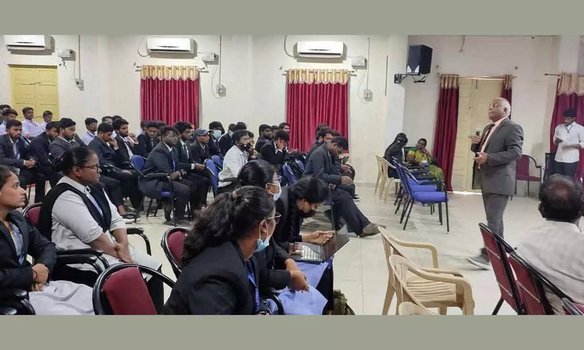 Director of Finance at Kushalava International, ARK Chowdary, addressing business management students at Andhra Loyola College in Vijayawada on Thursday