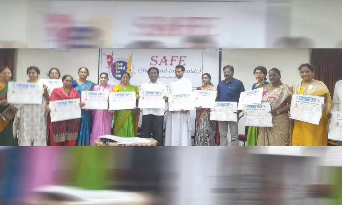 MLC KS Lakshmana Rao and Andhra Loyola College vice-principal Fr Dr YS Prabhu releasing posters of the forthcoming science expo, at Andhra Loyola College in Vijayawada on Friday