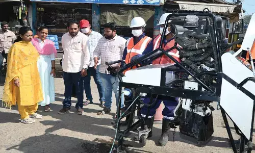 Municipal Commissioner D Haritha inspecting de-sledging operations in Nellore on Friday