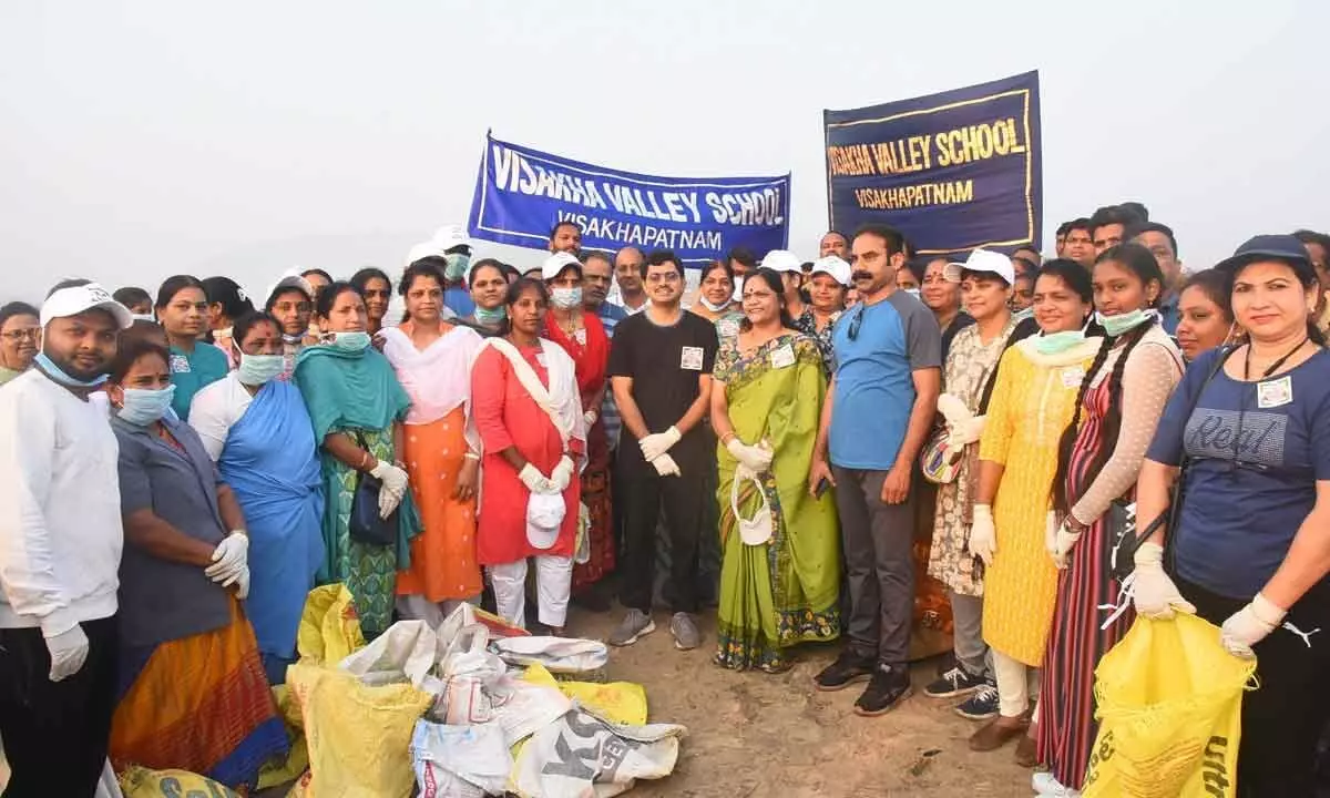 District Collector A Mallikarjuna along with other volunteers at the beach clean-up activity in Visakhapatnam on Sunday