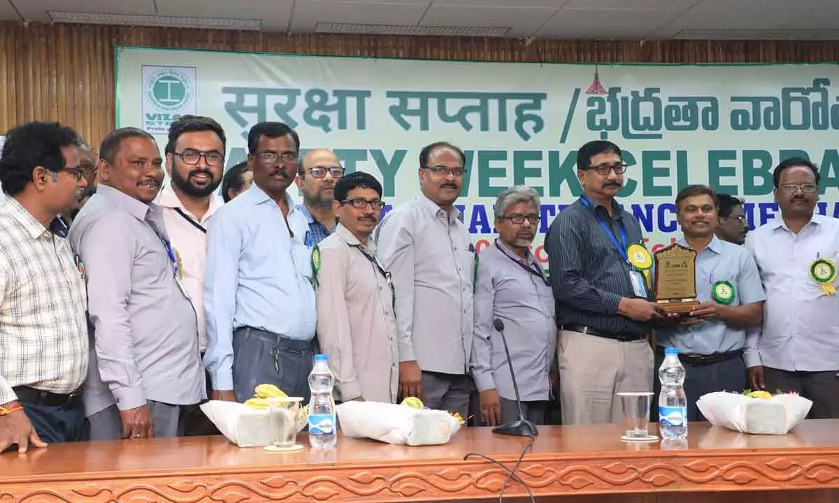 The guests presenting prizes to the winners of various competitions in Visakhapatnam on Sunday