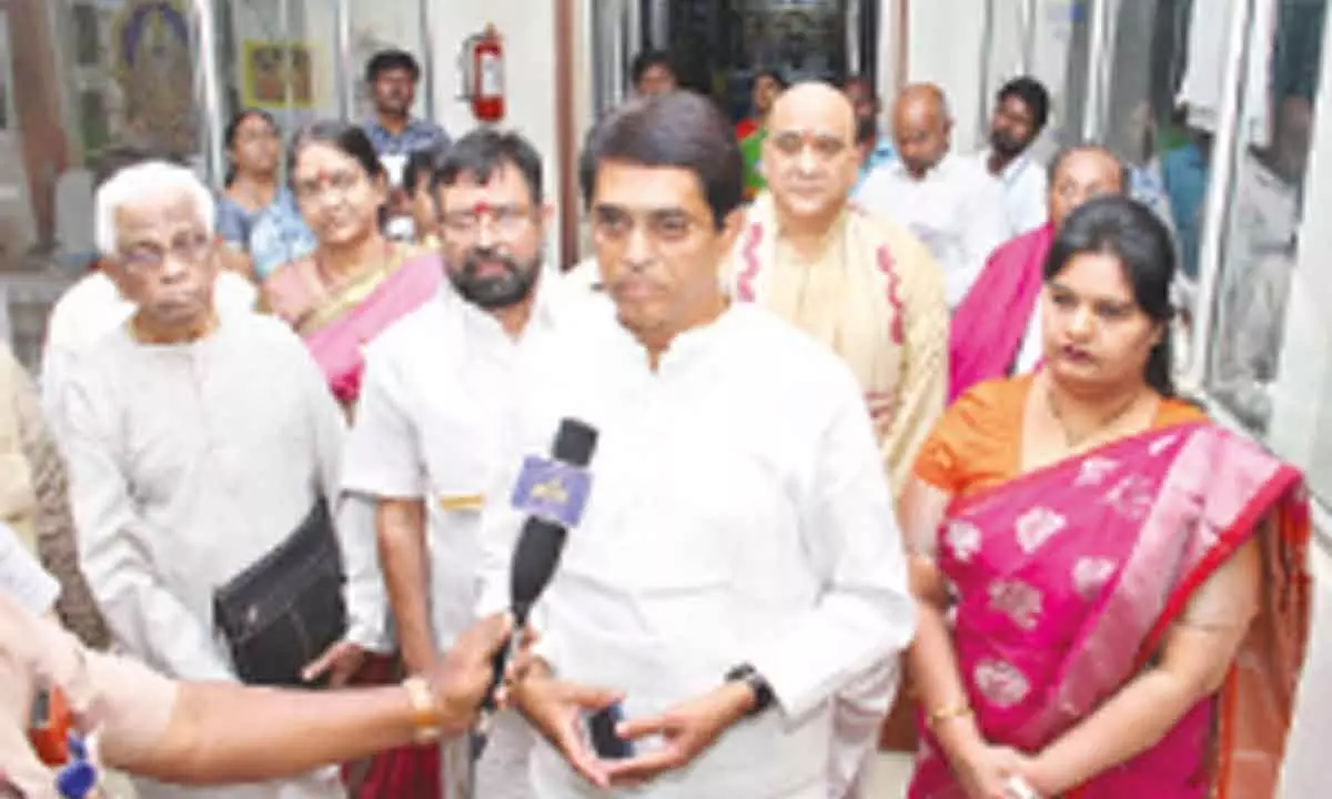 Finance Minister Buggana Rajendranath Reddy during a visit to TTD Publications office in Tirupati on Sunday.  JEO Sada Bhargavi and others are also seen.