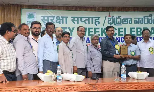 The guests presenting prizes to the winners of various competitions in Visakhapatnam on Sunday