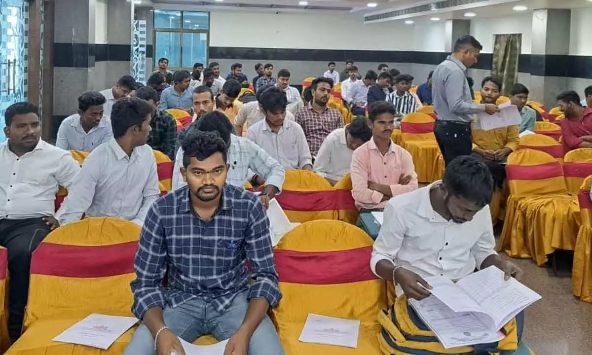 Students at the job fair held at Ilapuram Convention Centre in Vijayawada on Monday