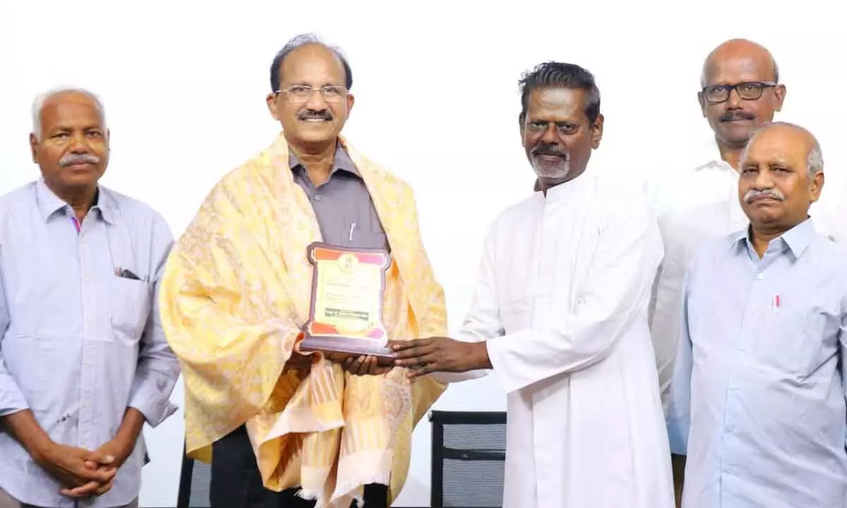 Prof K Ramamohan Rao, Vice-Chairman of Andhra Pradesh State Council of Higher Education and Vice-Chancellor of Krishna University, being felicitated at a national conference at Andhra Loyola College in Vijayawada on Monday