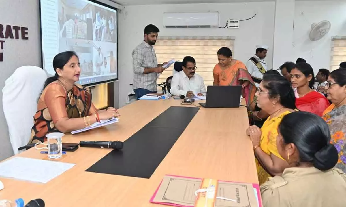 District Collector K Madhavi Latha speaking to a petitioner at Spandana programme at the Collectorate in Rajamahendravaram on Monday