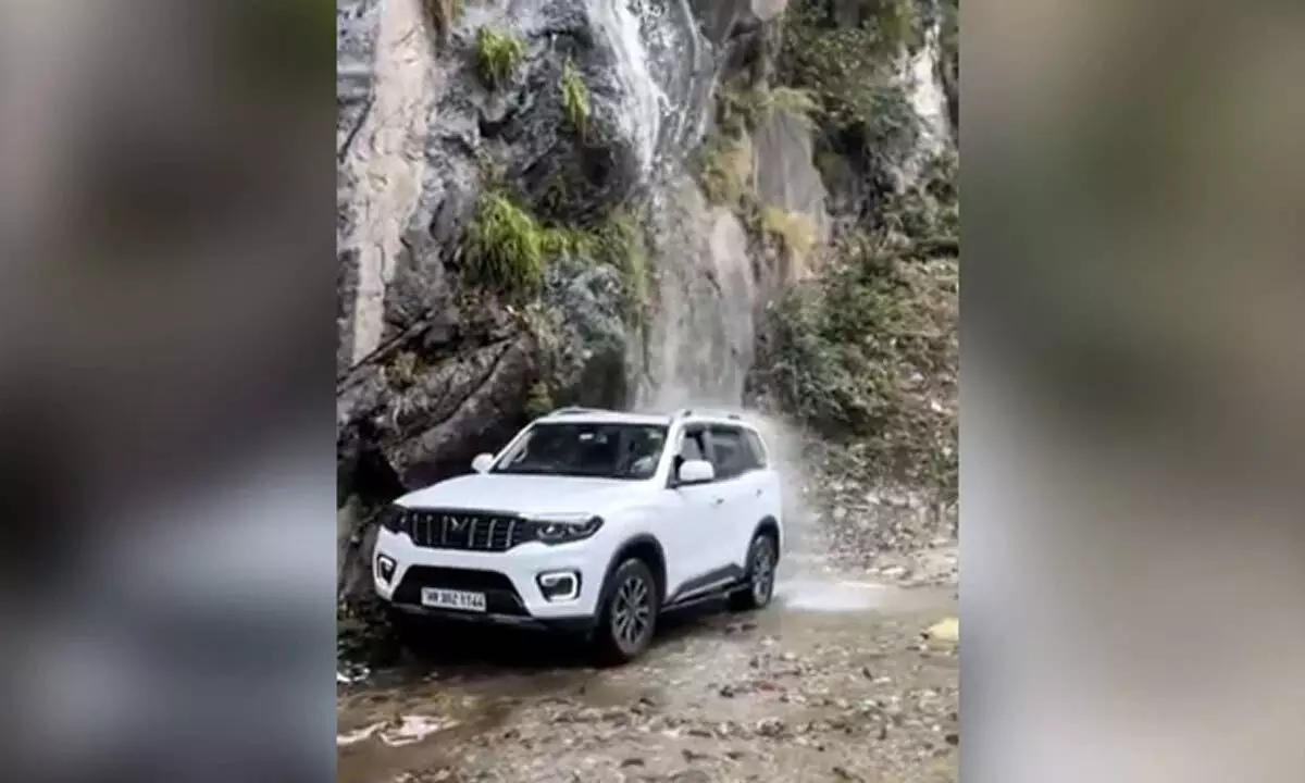 Watch The Trending Video Of A Man Taking His SUV Under A Waterfall And It Starts Leaking