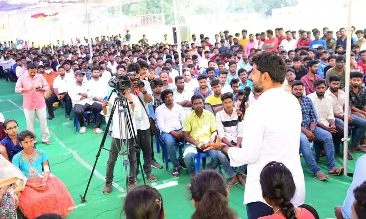 TDP national general secretary Nara Lokesh interacting with students at Irrangaripalle in Chandragiri constituency on Wednesday