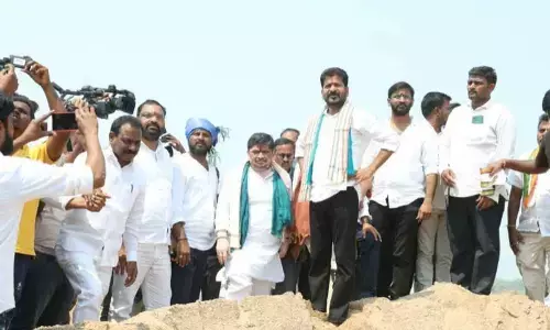 Revanth accuses BRS leaders of running sand, land & mines mafia