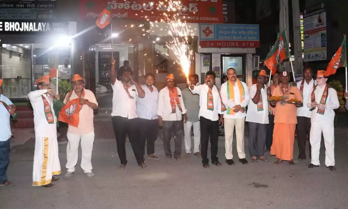 BJP activists celebrate party win in North-Eastern states