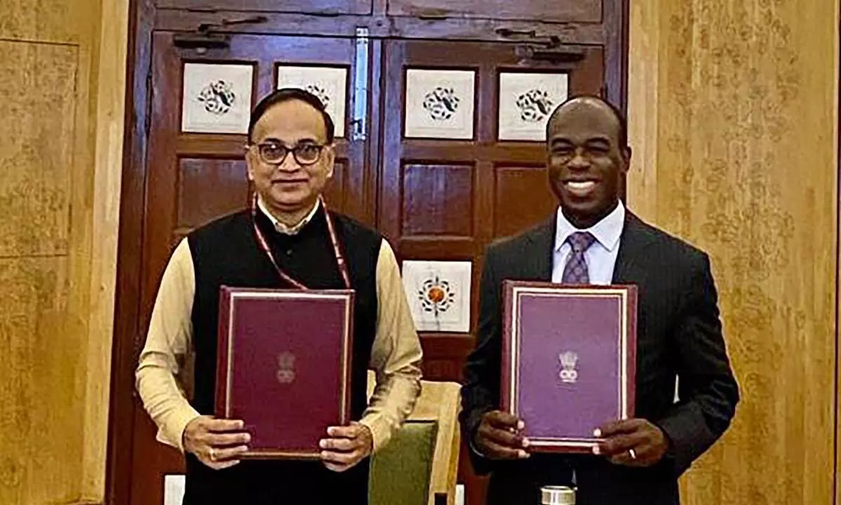 Rajat Kumar Mishra, Additional Secretary, Department of Economic Affairs, and World Bank India country director Auguste Tano Kouamé during signing of 2 complimentary loans worth $1 billion
