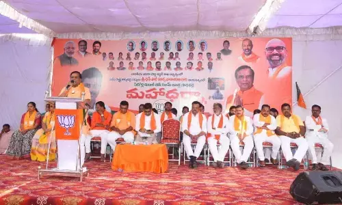 BJP stages protest for distribution of 2BHK houses